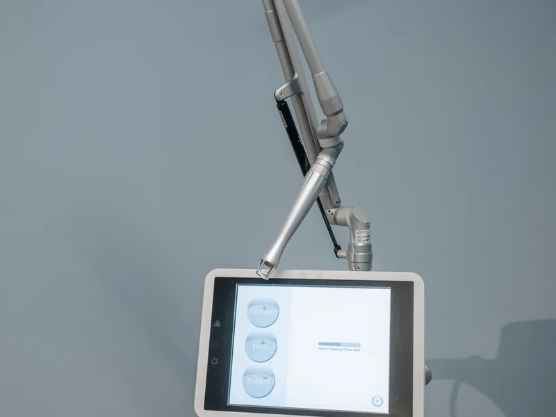 Aesthetic laser machine in a clinic treatment room